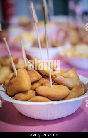 Fried savories and spring rolls with toothpicks serving as party finger food Stock Photo