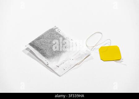 Single tea bag ready for brewing isolated on a clean white background Stock Photo