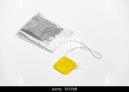Single tea bag ready for brewing isolated on a clean white background Stock Photo