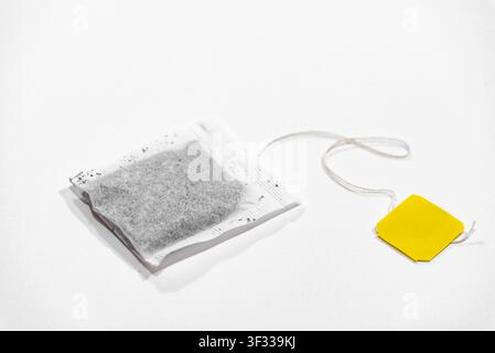 Single tea bag ready for brewing isolated on a clean white background Stock Photo