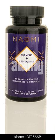 Winneconne, WI - 25 May 2026: A bottle of Naomi turmeric and resveratrol supplement on an isolated background. Stock Photo