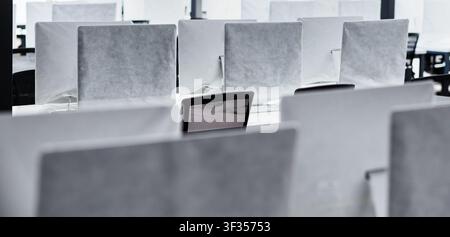 Close up of modern computers in covers, no people, panorama Stock Photo