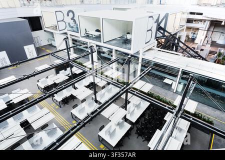Big open space office with covered computers Stock Photo