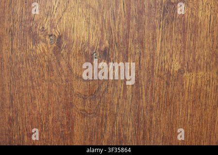 Brown wood surface displaying its natural texture, grain, and rustic details Stock Photo