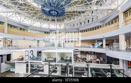 Modern office with isolated conference rooms with glass walls Stock Photo