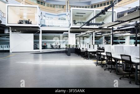Big rental open space with wrapped computers, no workers Stock Photo