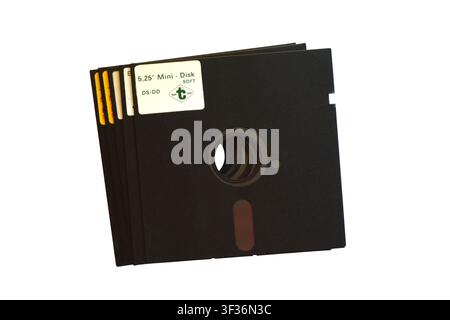 Stack of vintage 5.25-inch floppy disks isolated on a white background Stock Photo