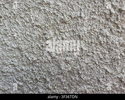 white stucco wall with rough plaster surface and minimal neutral texture background Stock Photo