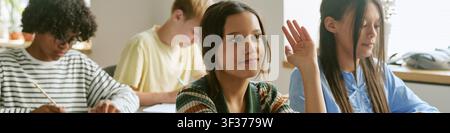 Header of Diverse Teen Students Studying in Classroom for Education Concept Stock Photo