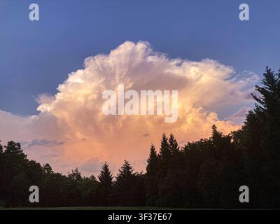 Large thunderstorm clouds during summer sunset, Pennsylvania USA Stock Photo