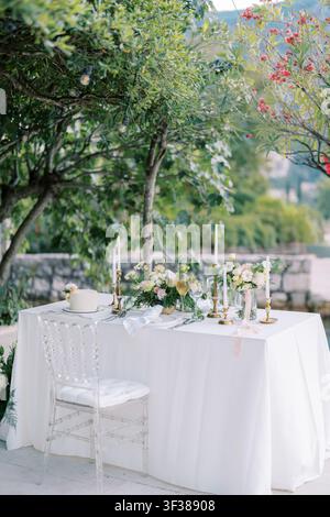 Elegant outdoor wedding reception table setting Stock Photo