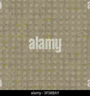 Top view of weathered washed aggregate concrete pavement with subtle grid lines and small weeds sprouting. Stock Photo