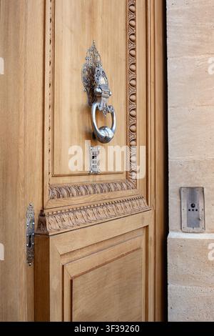 Stylish front door and modern intercom on a stone house Stock Photo
