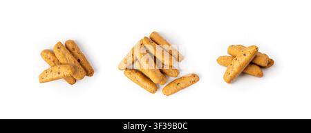Small breadsticks, short grissini or picos with fragrant herbs and seeds isolated. Crispy mini bread sticks on white background Stock Photo