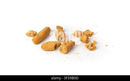 Small breadsticks, short grissini or picos with fragrant herbs and seeds isolated. Crispy mini bread sticks on white background Stock Photo