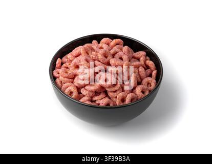 Pink Cereal Rings Isolated, Fruit Breakfast Rice Loops in Bowl, Corn Cereals Snack on White Background Stock Photo