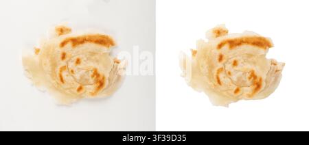 Kerala porotta known as paratha or parotta pieces isolated. Indian layered flat bread close up, flaky pita pieces, chapati or naan on white background Stock Photo