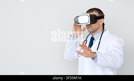 Doctor Using Virtual Reality Headset For Medical Purposes Stock Photo