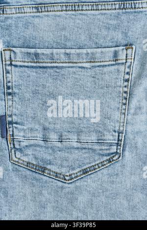 Detailed texture light blue cotton denim fabric with diagonal weave pattern macro close up Stock Photo