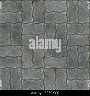 A full-frame background of grey wave-shaped interlocking concrete paving blocks arranged in alternating directions. Stock Photo