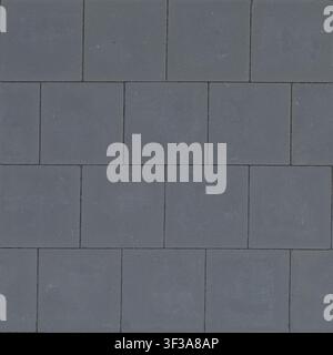 Top down view of seamless dark charcoal grey square concrete paving tiles laid in an offset running bond layout. Stock Photo
