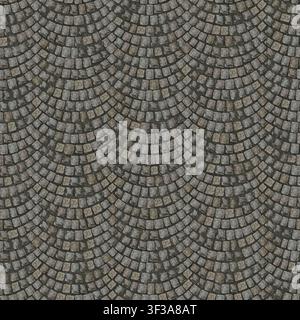 Top down view of small dark granite cobblestones arranged in fan-shaped concentric arcs. Stock Photo