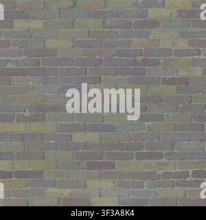 Top down shot of thin multi-colored clay brick pavers in yellow, brown, and purple hues. Stock Photo