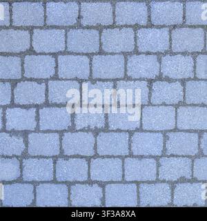 A seamless top down texture of blue grey rectangular concrete pavers arranged in staggered rows. Stock Photo