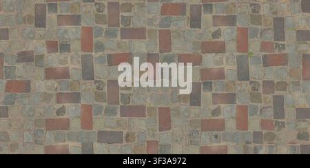 Seamless texture of mixed red and grey rectangular stone pavers arranged in a random block pattern. Stock Photo