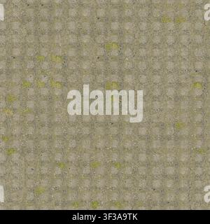Top view of weathered washed aggregate concrete pavement with subtle grid lines and small weeds sprouting. Stock Photo