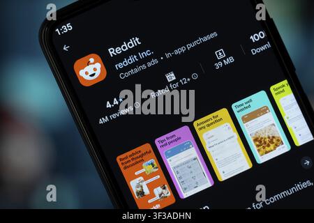 San Francisco, United States - 12 July 2026: Reddit app page on Google Play Store on a smartphone screen Stock Photo