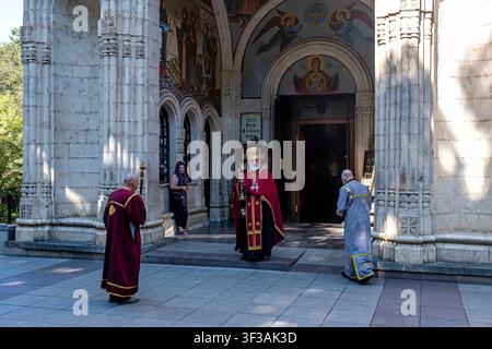 Tbilisi, Georgia. 22nd July, 2026. A priest blesses a church by using incense for purification while others accompany him in Tbilisi, Georgia. (Credit Image: © Moe Zoyari/ZUMA Press Wire) EDITORIAL USAGE ONLY! Not for Commercial USAGE! Stock Photo