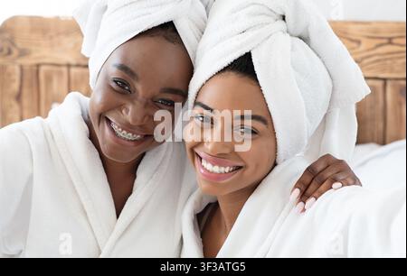 Pretty african women having ladies day at home Stock Photo