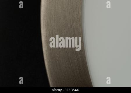 Clean brushed metal surface in plastic frame macro close up view Stock Photo