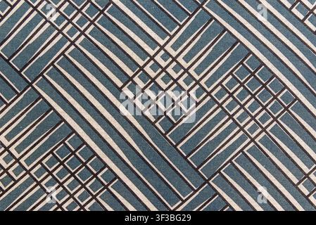 Blue and white textile texture featuring a modern architectural grid pattern. Geometric abstract pattern fabric background with copy space. Stock Photo