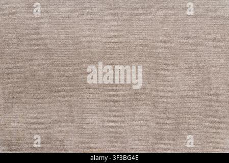 Beige woven carpet texture background with copy space. Minimalist textile surface banner featuring tight fabric loops. Stock Photo