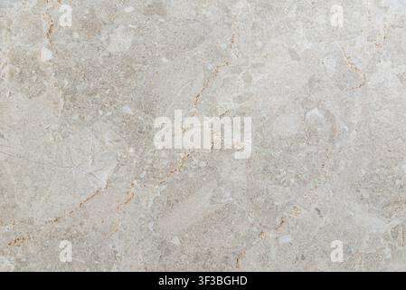Beige marble stone texture background with copy space. Minimalist light marble surface banner featuring natural veins. Elegant stone texture backgroun Stock Photo