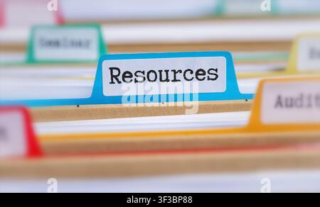 File folders with a tab labeled Resources Stock Photo