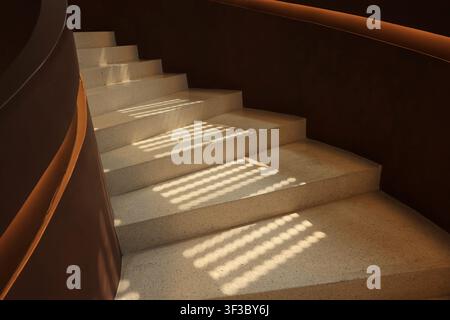 Light and Shadow on Brown Ceramic Curvy Stair. Stock Photo