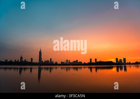 Italian Paint Colours Sunset paints sky in soft gold and lavender hues. Cityscape nestles ...