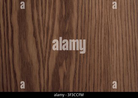 Top view flat lay of dark brown walnut wooden panel texture surface with vertical grain pattern for interior architecture design material background o Stock Photo