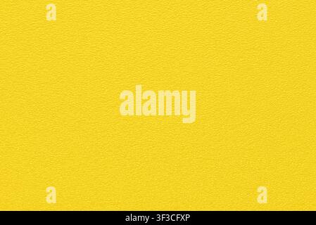 uniform plastic grainy bubble texture vibrant yellow background Stock Photo