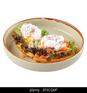 Waffles with salmon and poached eggs isolated Stock Photo