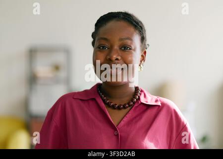 Portrait of Black Adult Woman Smiling for Professional Profile Stock Photo