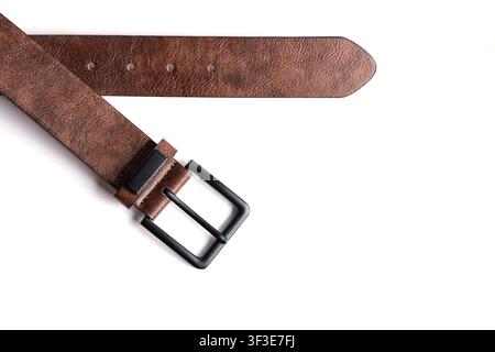 Stylish brown textured leather belt with black metal buckle isolated on white background Stock Photo