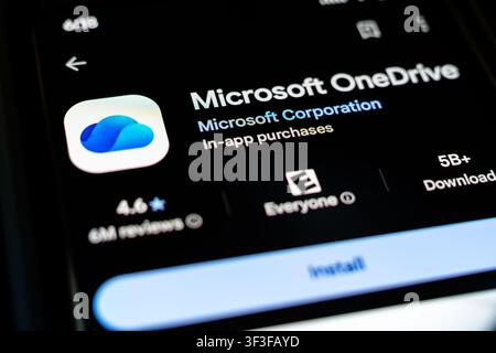 Microsoft OneDrive Cloud Storage App by Microsoft Corporation Displayed on Smartphone Screen in Google Play Store Listing Stock Photo