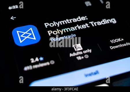 Polymtrade Polymarket Trading App Displayed on Smartphone Screen in Google Play Store Listing Stock Photo