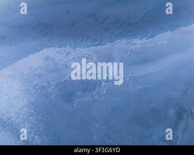Aerial view of the intricate salt crust patterns and dried lake bed textures of Pink Lake in Esperance, Western Australia, Australia. Stock Photo