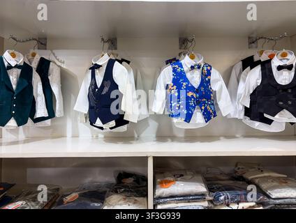 Stylish Baby Boys Formal Waistcoat Suits Displayed In Kids Clothing Store shot is taken at jodhpur rajasthan india on July 10 2026. Stock Photo