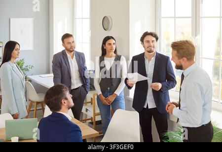 Business people group, team leader giving presentation of new project, boardroom at company meeting Stock Photo